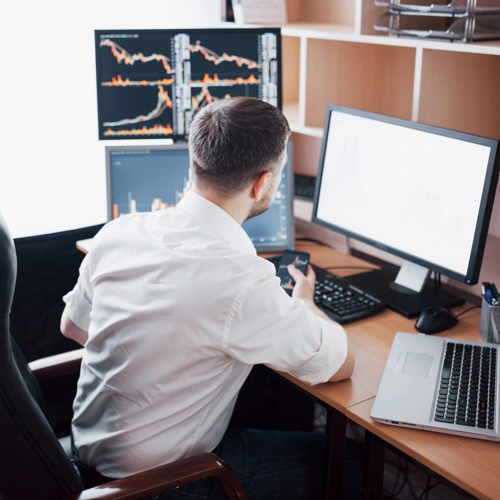 Business man investment trading do this deal on a stock exchange. People working in the office.